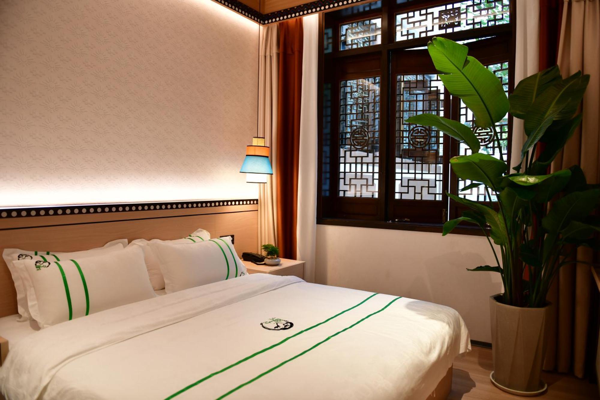 Xishu Garden Inn - Travel Agency Service - Car Rent Service - English Speaking เฉิงตู ภายนอก รูปภาพ
